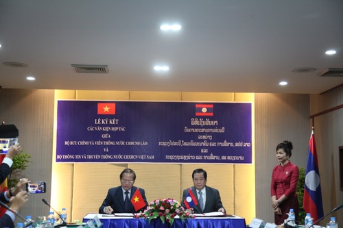 СРВ и Лаос активизируют сотрудничество в области информации и телекоммуникаций - ảnh 1